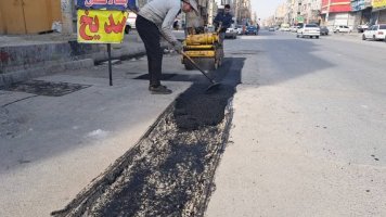 در ادامه نهضت آسفالت در شهرملارد... انجام عملیات لکه گیری آسفالت در خیابانهای آزادگان و  ۱۰ متری فرزانه