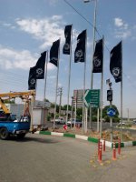 اهتزاز بیرق های مشکی بمناسبت  شب های عزاداری حضرت امیرالمومنین علی (ع) در شهرملارد