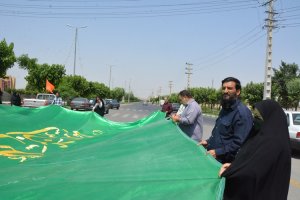  پرچم بزرگ متبرک به نام علی بن موسی الرضا (ع) در ملارد به اهتزاز درآمد.