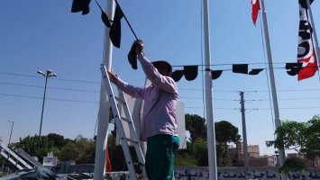 فضاسازی و سیاه پوش کردن سطح شهر ملارد به مناسبت ماه محرم